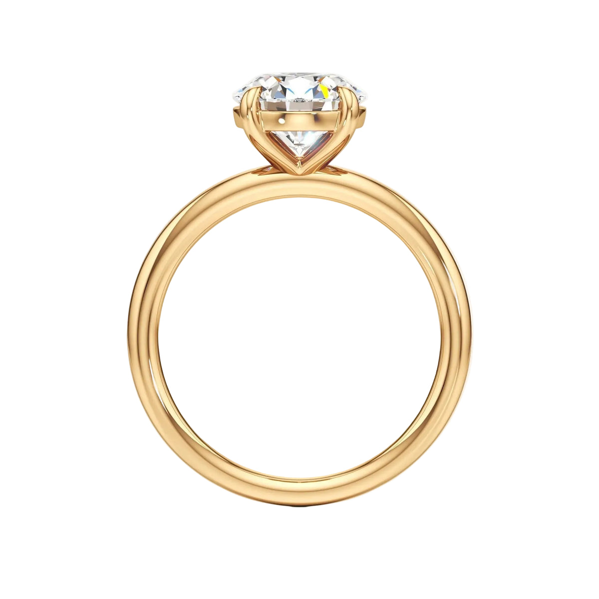 A yellow gold ring with a Round-shaped clear gemstone in a prong setting, shown from a side profile view against a light gray background.