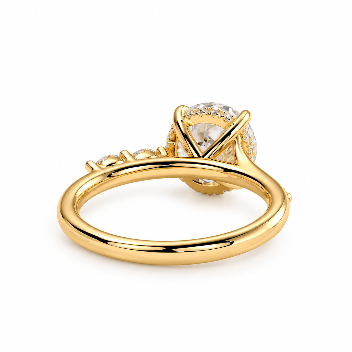 Engagement ring with a 2ct solitaire in a hidden halo setting with cathedral setting and marquise, diamond