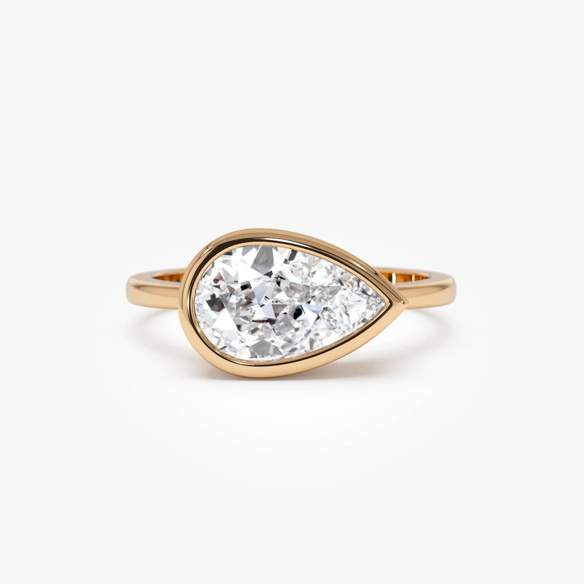 pear lab grown diamond engagement ring in gold, side profile