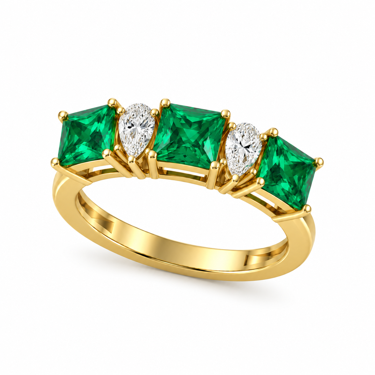 A yellow gold ring featuring three emerald-cut green gemstones and two pear-cut clear diamonds, set on a polished gold band against a white background.