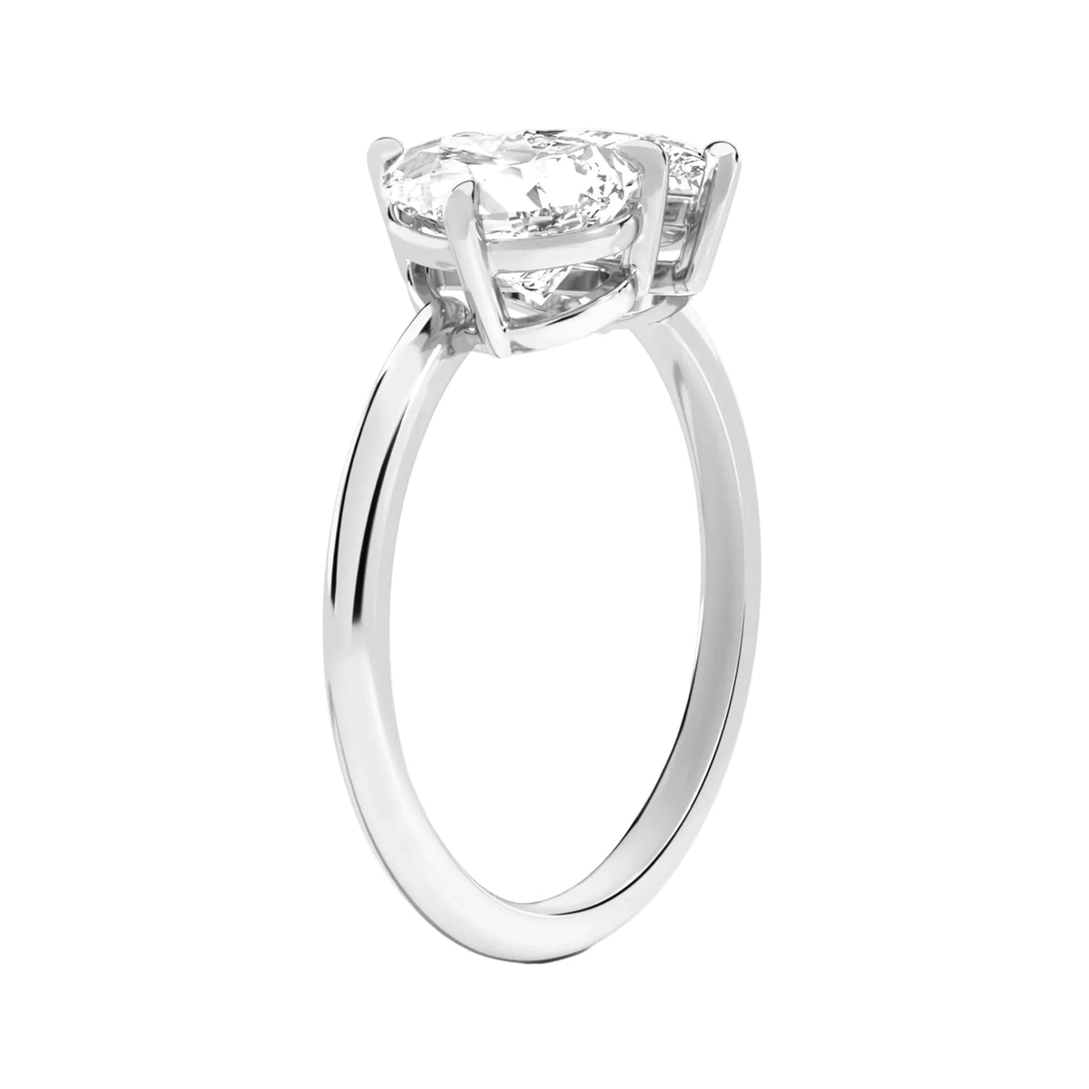 pear lab grown diamond engagement ring in various metals, top view