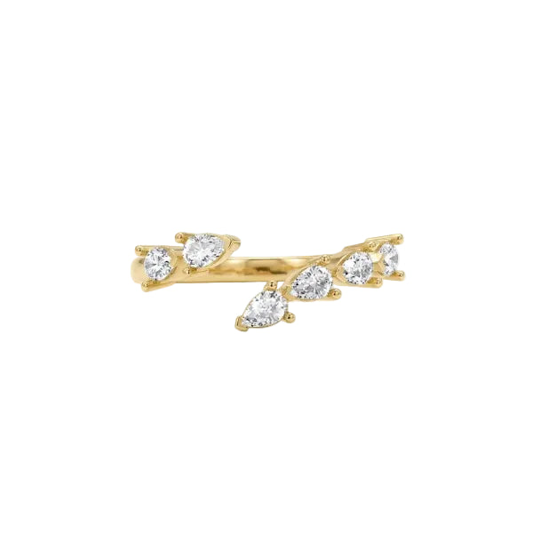 A gold branch-shaped ring featuring five clear pear-cut gemstones, photographed on a clean white background.