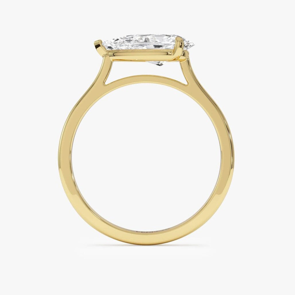 pear lab grown diamond engagement ring in gold, top view