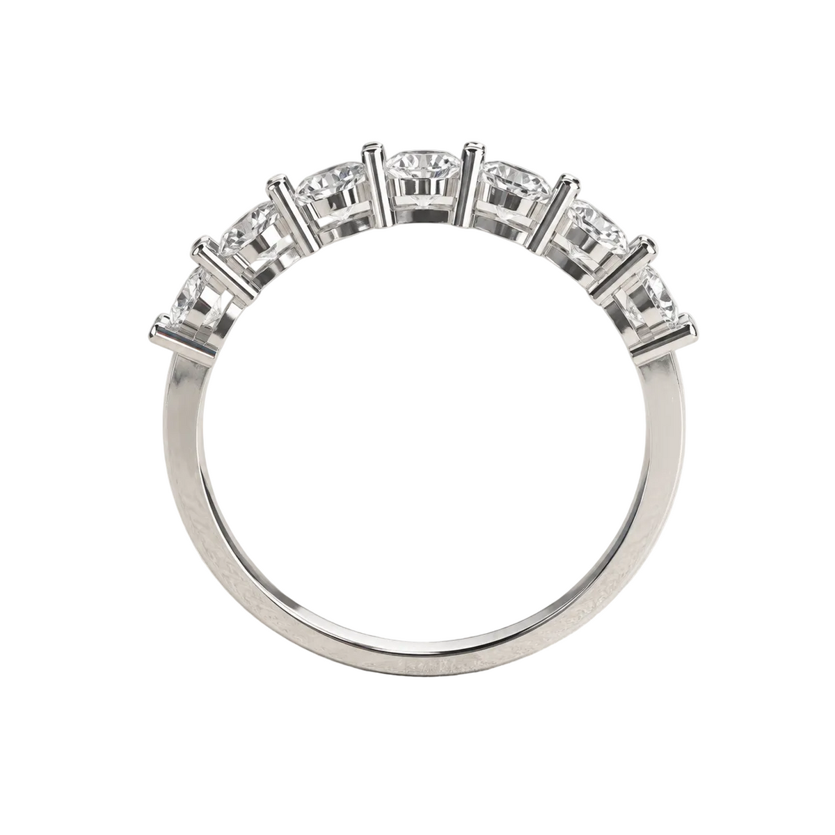 A silver-toned diamond ring with five round-cut stones set in a half-circle arrangement, shown on a textured light gray background.