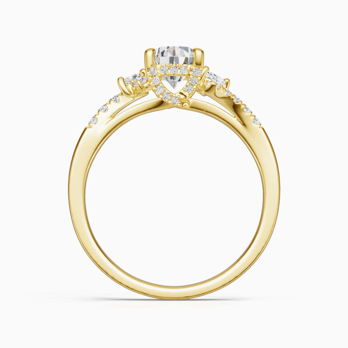 A yellow gold engagement ring featuring a heart-shaped clear center stone and small pavé-set diamonds along the shoulders, shown on a clean white background.