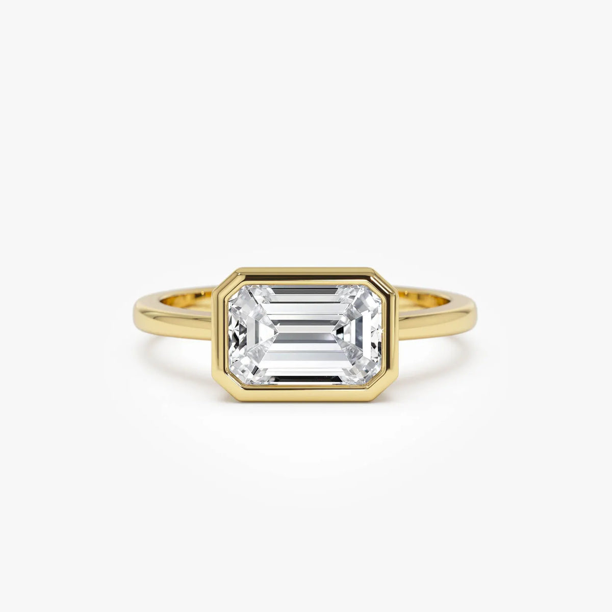 emerald lab grown diamond engagement ring in gold, three-quarter view