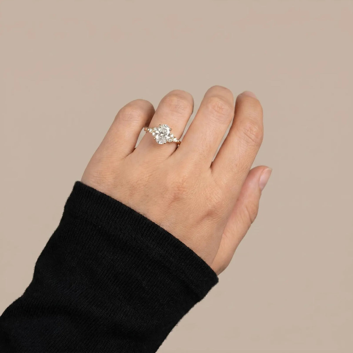 oval lab grown diamond engagement ring in gold, on-hand