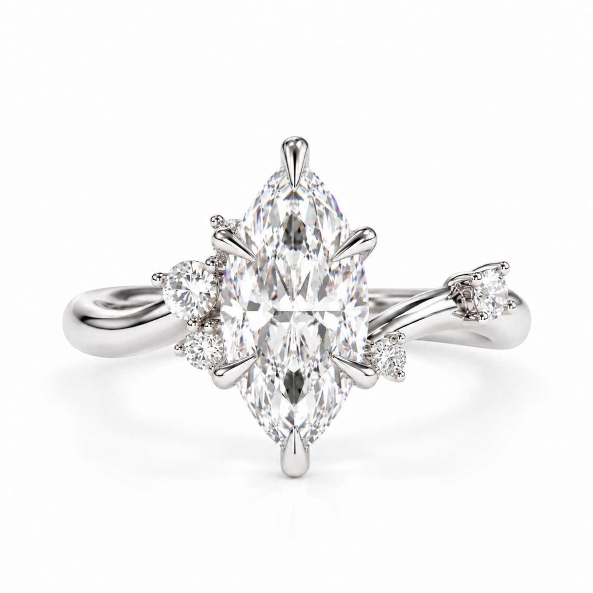 A marquise-cut diamond engagement ring with a silver-toned band and smaller accent diamonds, centered on a plain white background.