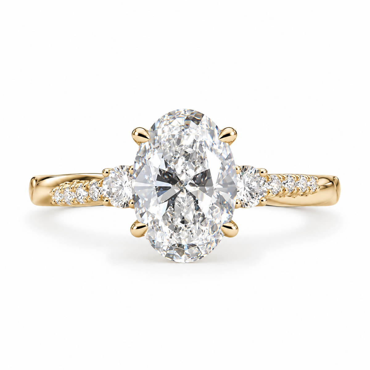 oval lab grown diamond engagement ring in gold, three-quarter view