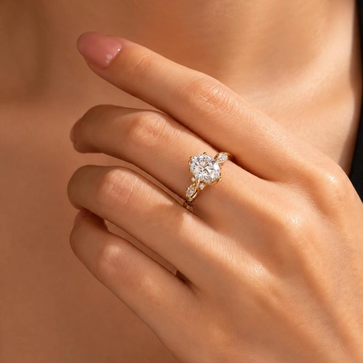 oval lab grown diamond engagement ring in gold, angled view