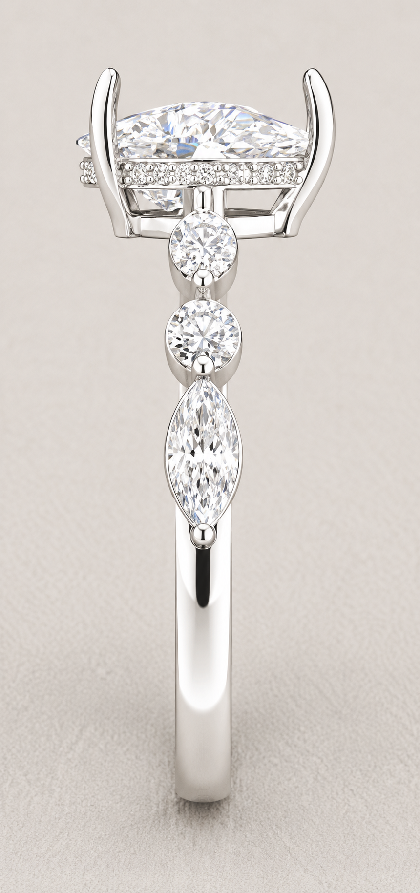 pear lab grown diamond engagement ring in silver, side profile