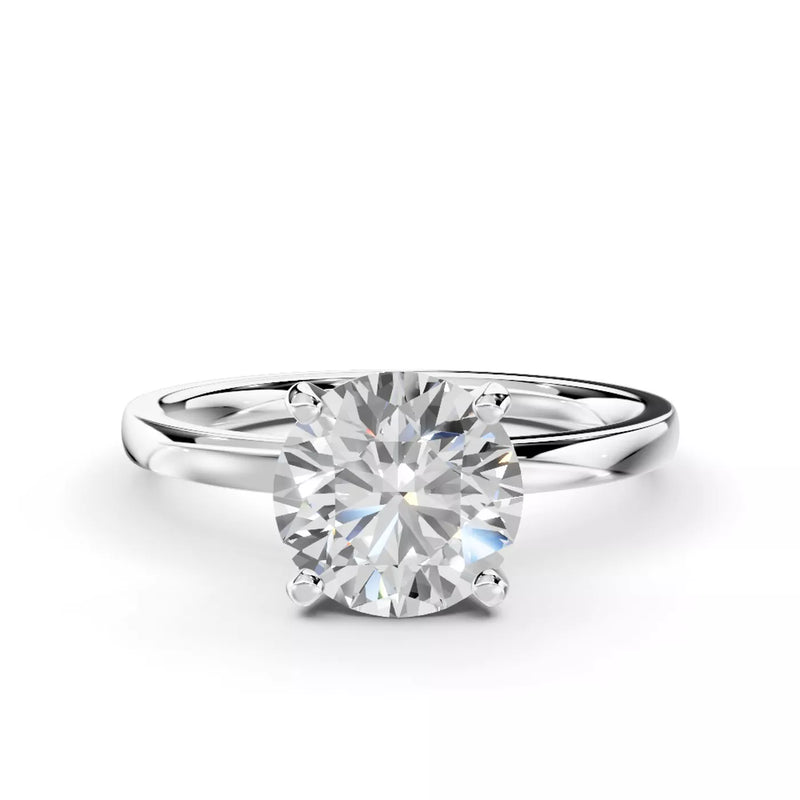 emerald lab grown diamond engagement ring in silver, three-quarter view