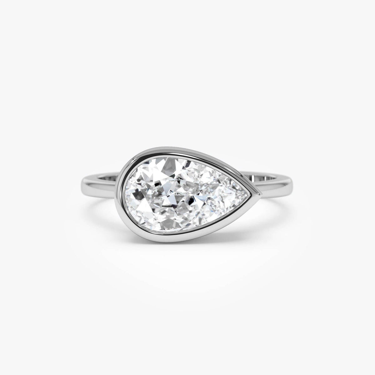 pear lab grown diamond engagement ring in gold, top view