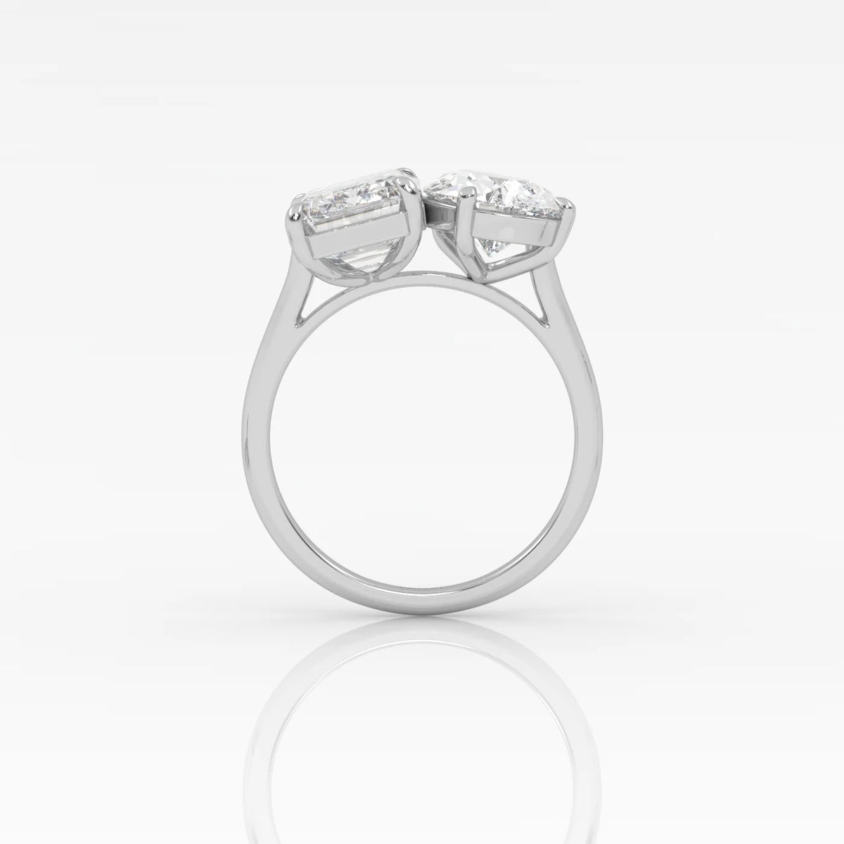 The Emerald and Pear Toi et Moi ring