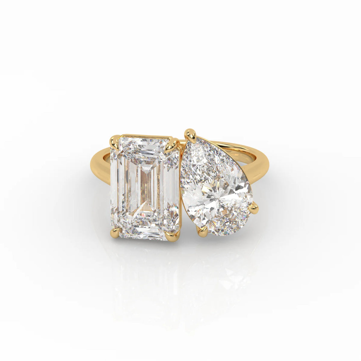 The Emerald and Pear Toi et Moi ring