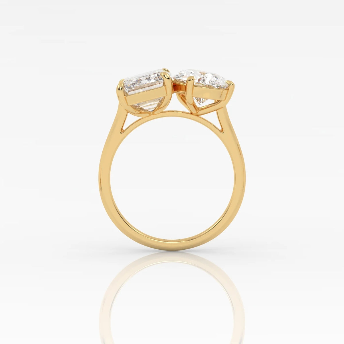 The Emerald and Pear Toi et Moi ring
