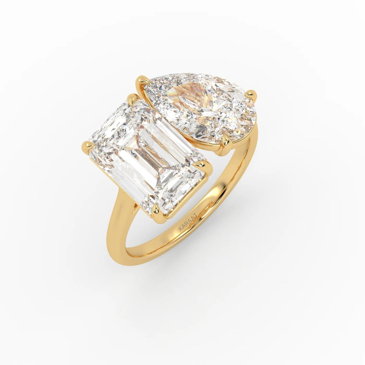 The Emerald and Pear Toi et Moi ring