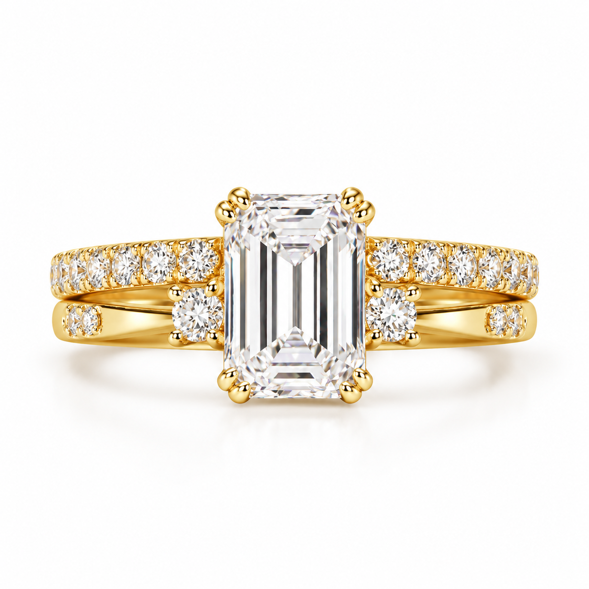 Two carat emerald cut lab-grown diamond bridal ring set with matching bands