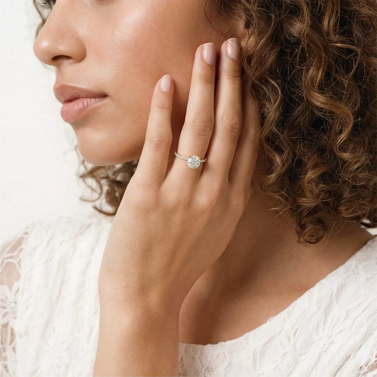round lab grown diamond engagement ring in 18k, back view