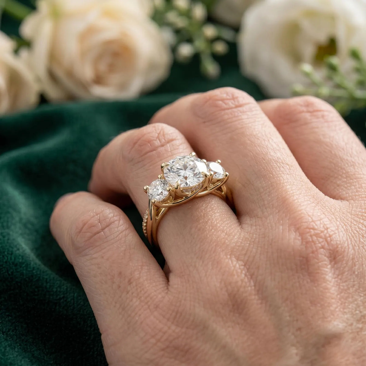 round lab grown diamond engagement ring in gold, angled view