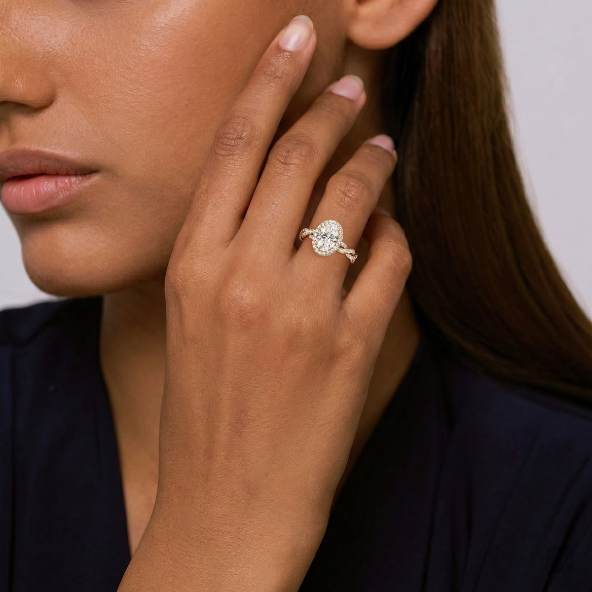 oval lab grown diamond engagement ring in silver, side profile