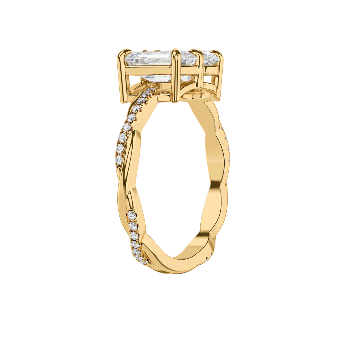 A yellow gold ring with a three-stone engagement setting featuring baguette-cut clear gemstones and a twisted shank accented with small pavé diamonds, shown on a light gray background.