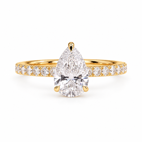 pear lab grown diamond engagement ring in gold, three-quarter view