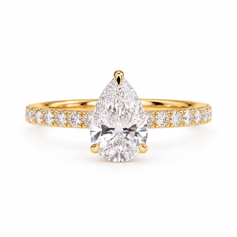 pear lab grown diamond engagement ring in gold, three-quarter view