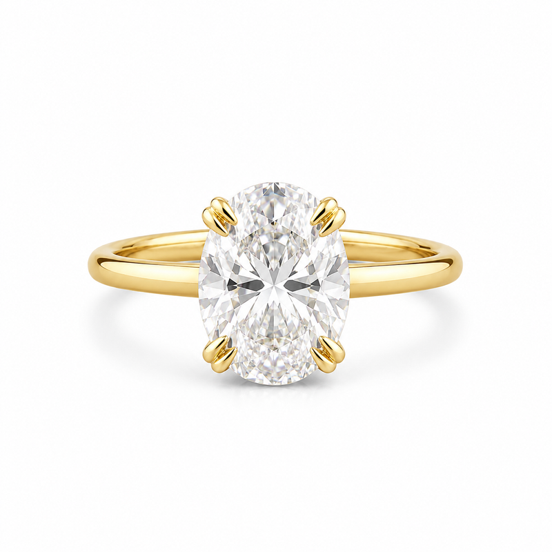 oval lab grown diamond engagement ring in gold, three-quarter view