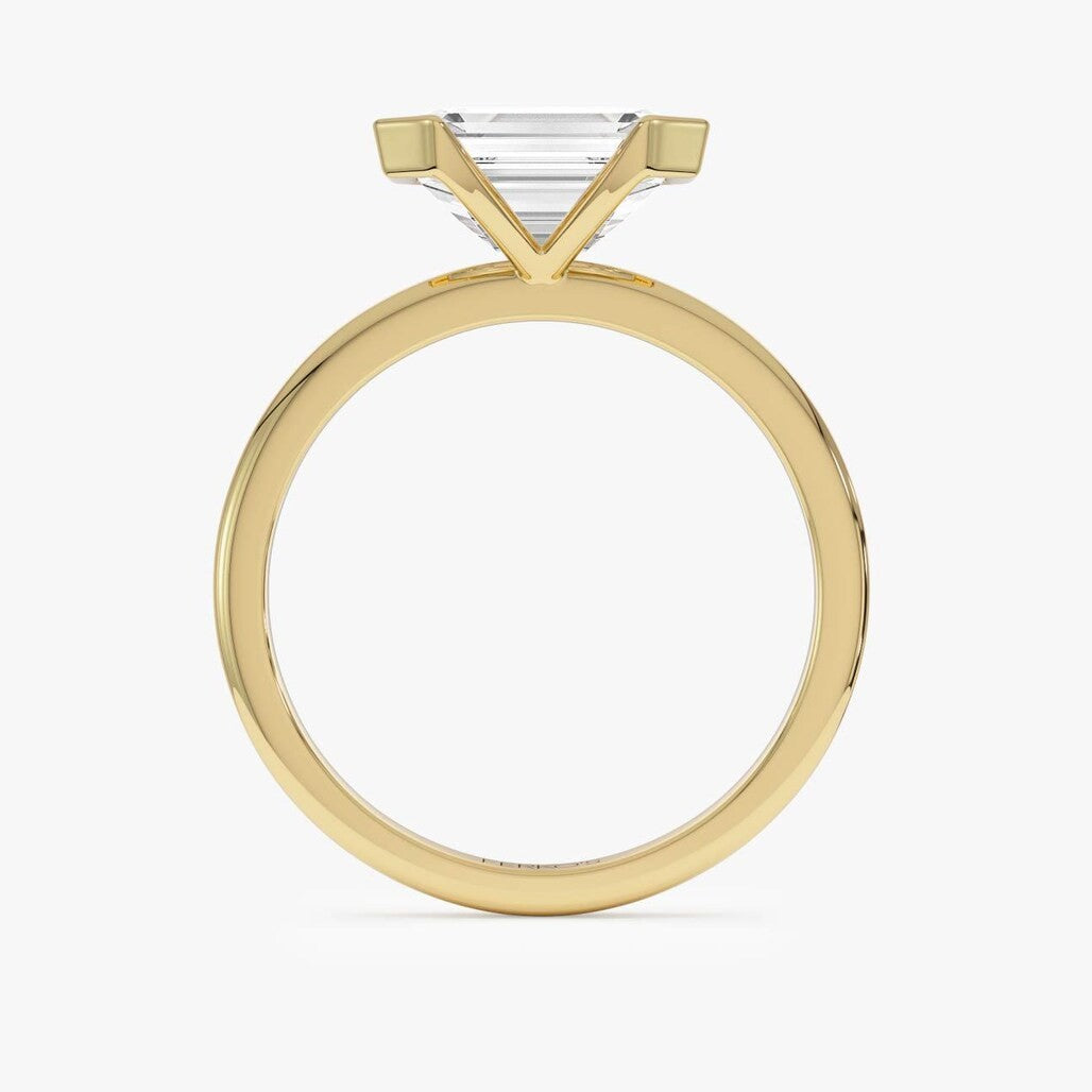 emerald lab grown diamond engagement ring in gold, top view