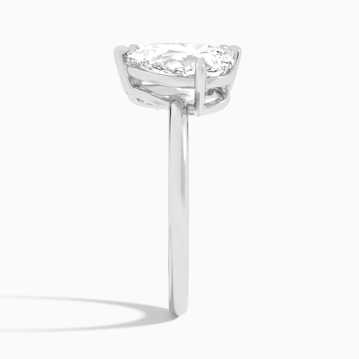 pear lab grown diamond engagement ring in various metals, side profile