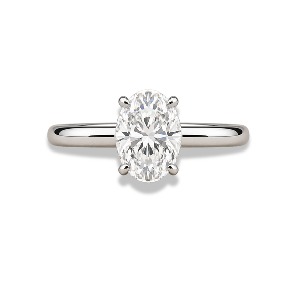 emerald lab grown diamond engagement ring in silver, three-quarter view