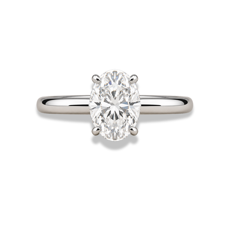 emerald lab grown diamond engagement ring in silver, three-quarter view