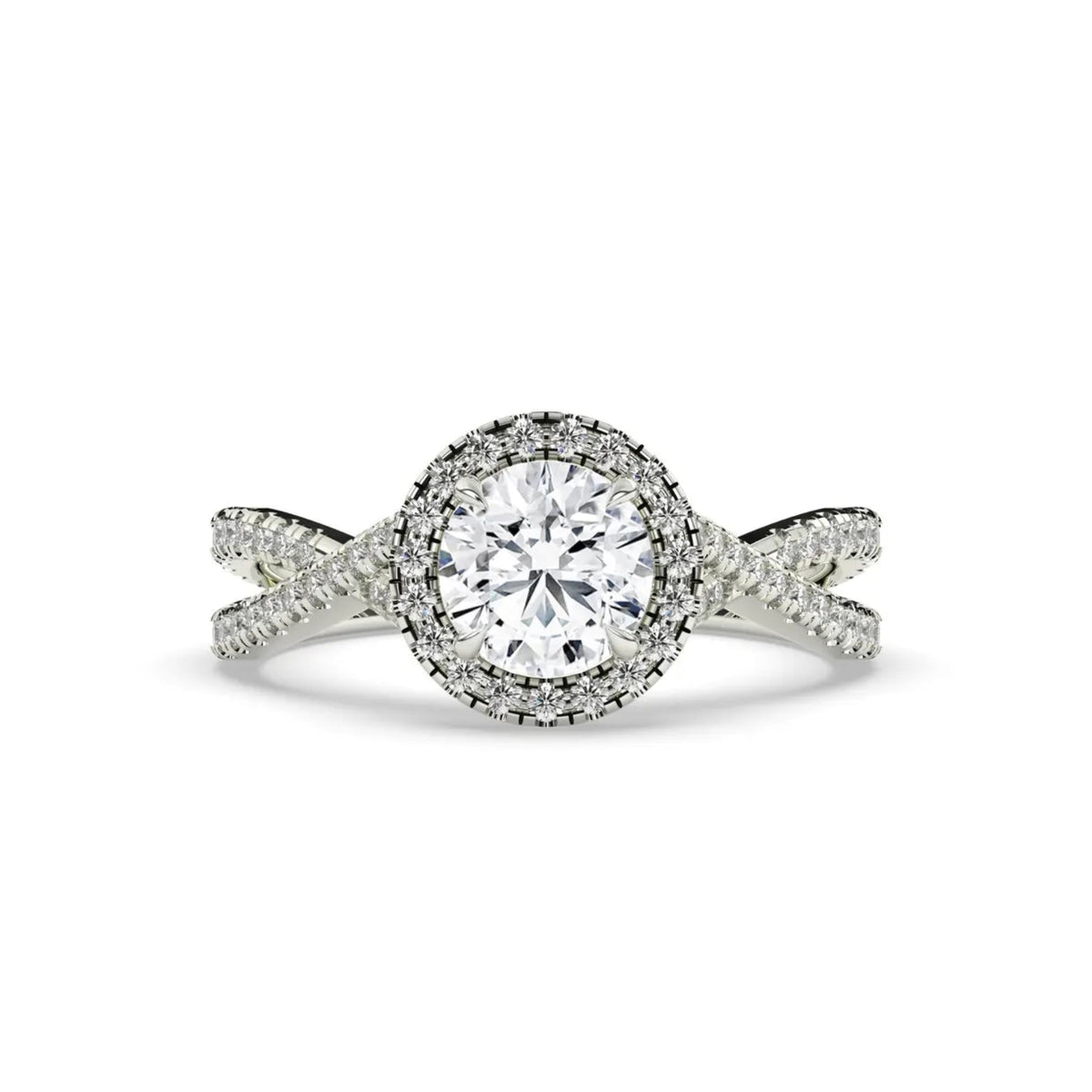 A silver-toned halo ring featuring a round-cut center stone surrounded by a double halo of smaller pavé-set stones, with a twisted split-shank band, shown on a plain white background.