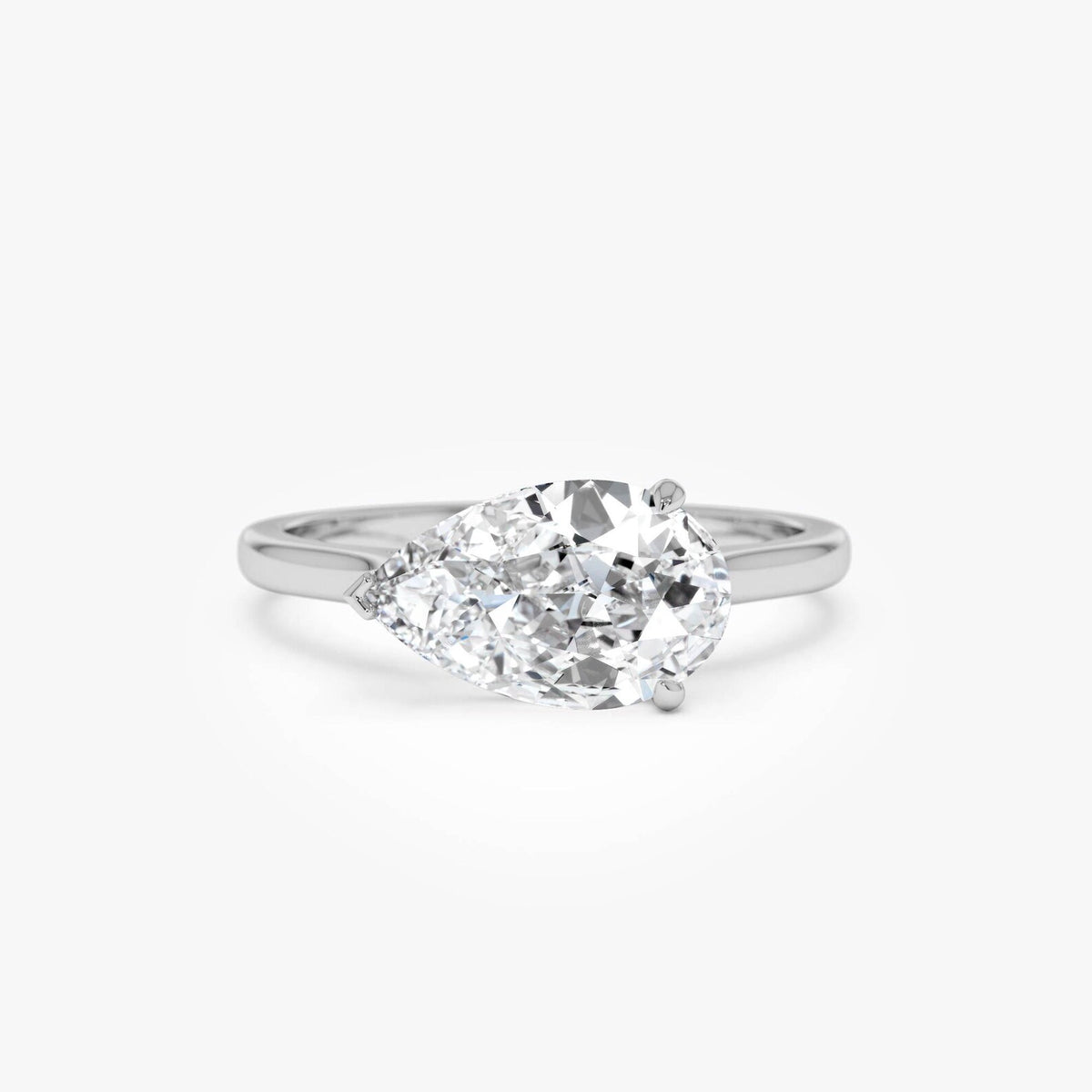 pear lab grown diamond engagement ring in gold, side profile