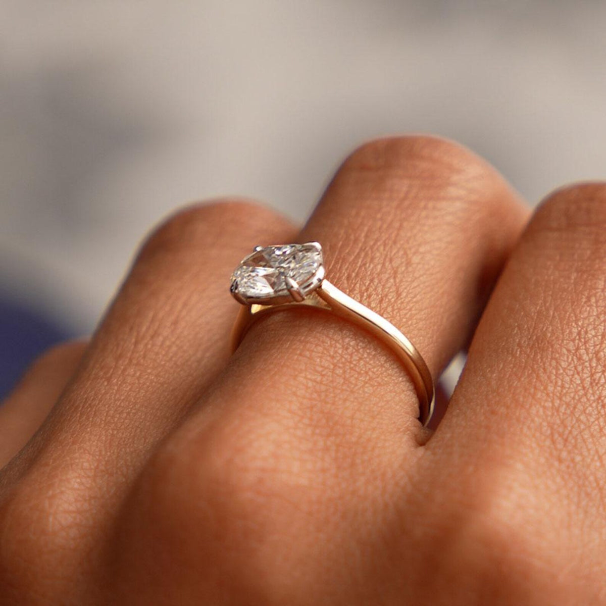 oval lab grown diamond engagement ring in gold, detail of the setting