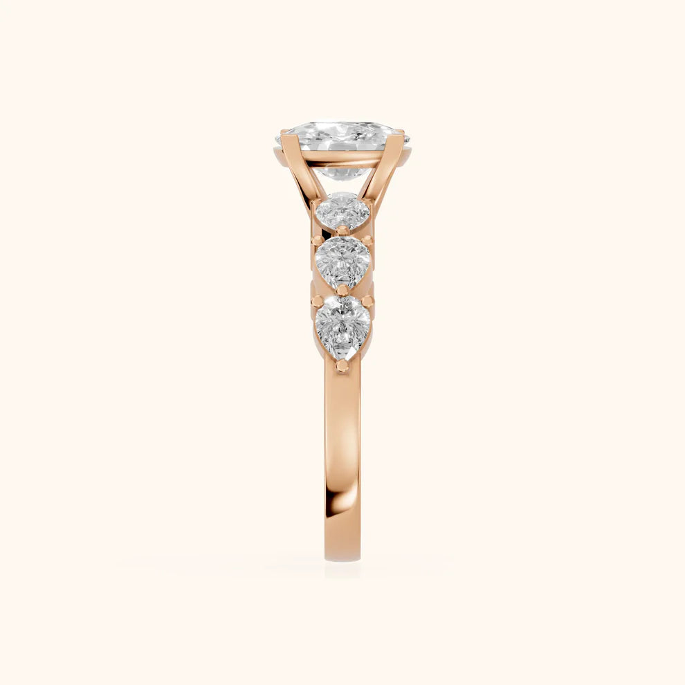 Round Cut Lab Grown Diamond & Moissanite Three Stone Engagement Ring with Pear Side Stones