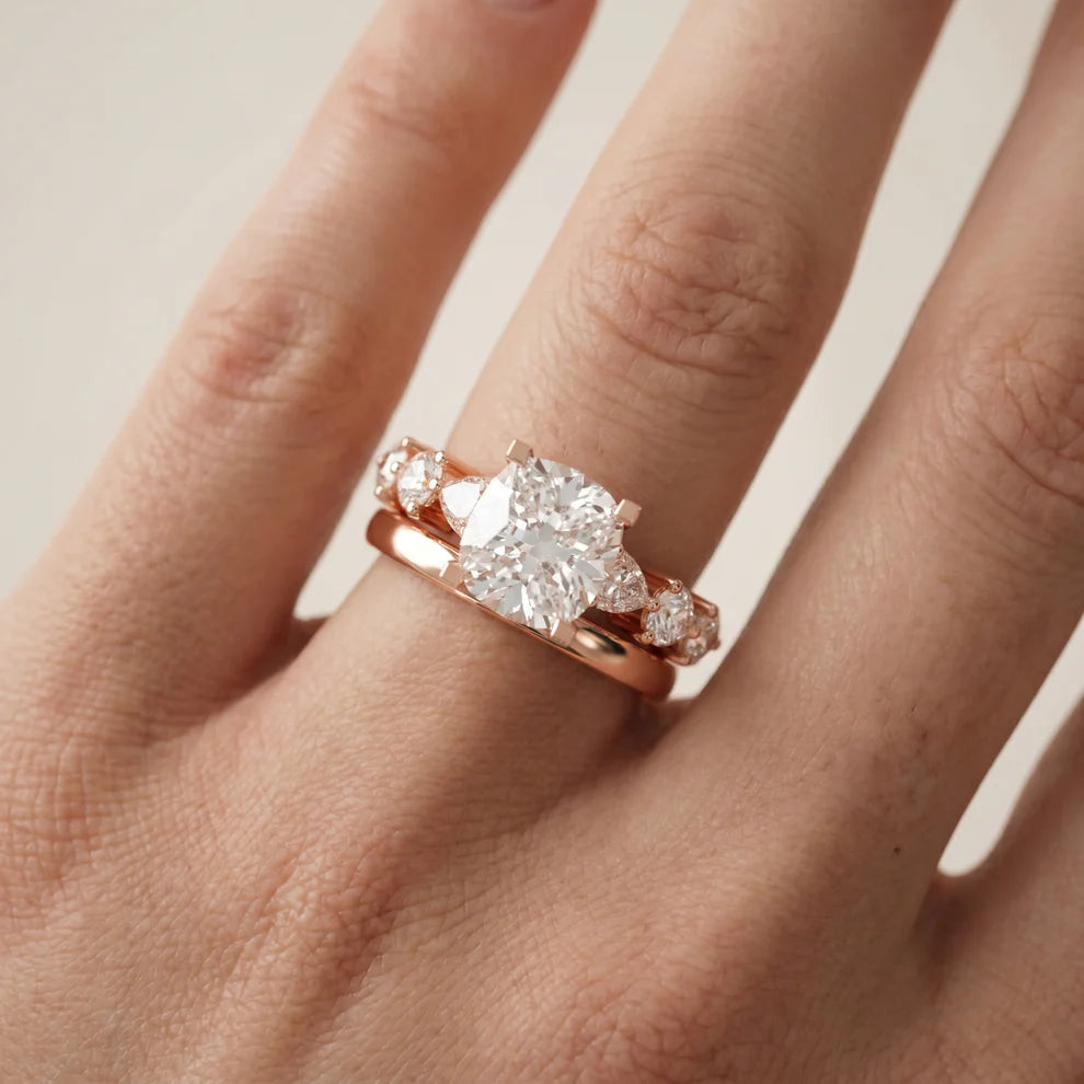 Round Cut Lab Grown Diamond & Moissanite Three Stone Engagement Ring with Pear Side Stones