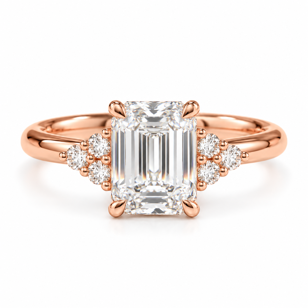 Engagement ring with a 2ct emerald cut solitaire with cluster accents and tapered band