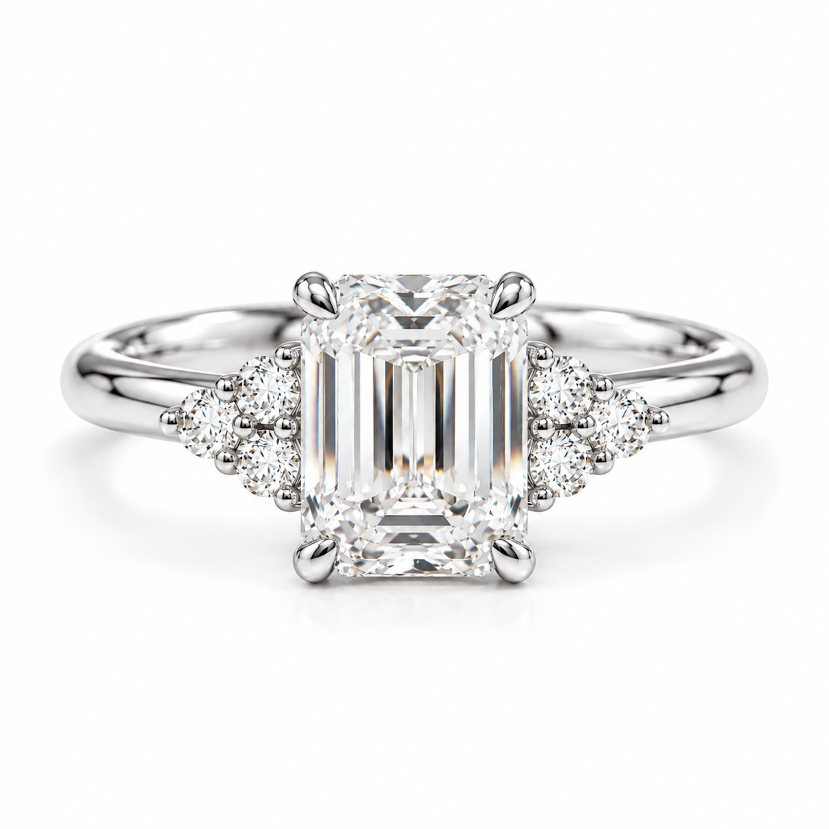 Engagement ring with a 2ct emerald cut solitaire with cluster accents and tapered band