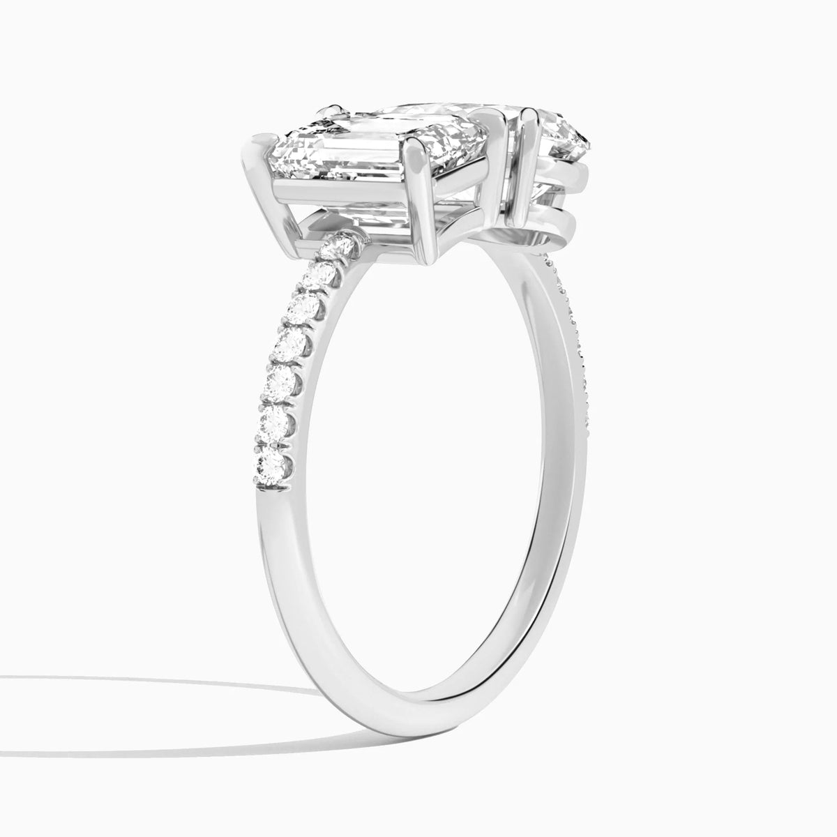 Toi et Moi Emerald and Pear Accented Diamond Engagement Ring