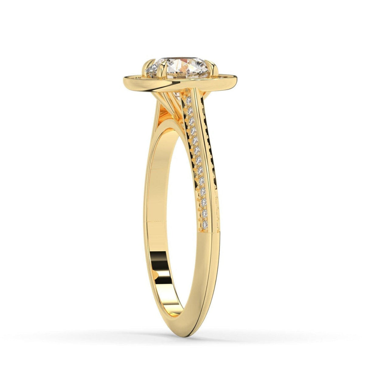 A yellow gold diamond ring with a round-cut center stone and pavé-set diamonds along the shank, shown from a side profile on a white background.