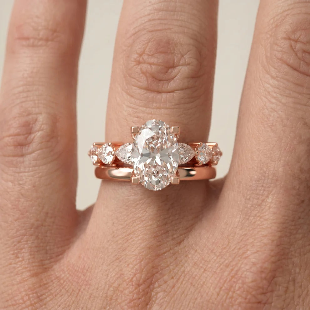 Oval Cut Lab Grown Diamond & Moissanite Three Stone Engagement Ring with Round Side Stones