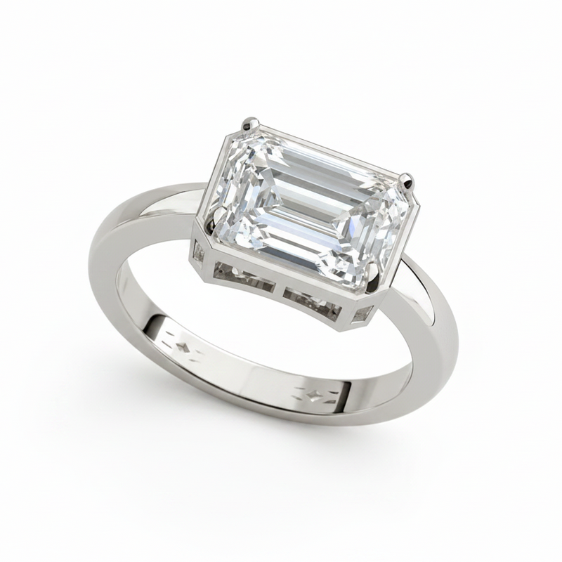 emerald lab grown diamond engagement ring in silver, three-quarter view