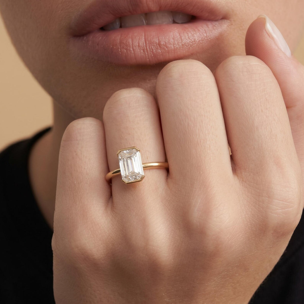 Emerald cut solitaire engagement ring with lab-grown diamond – Modern bezelbar setting