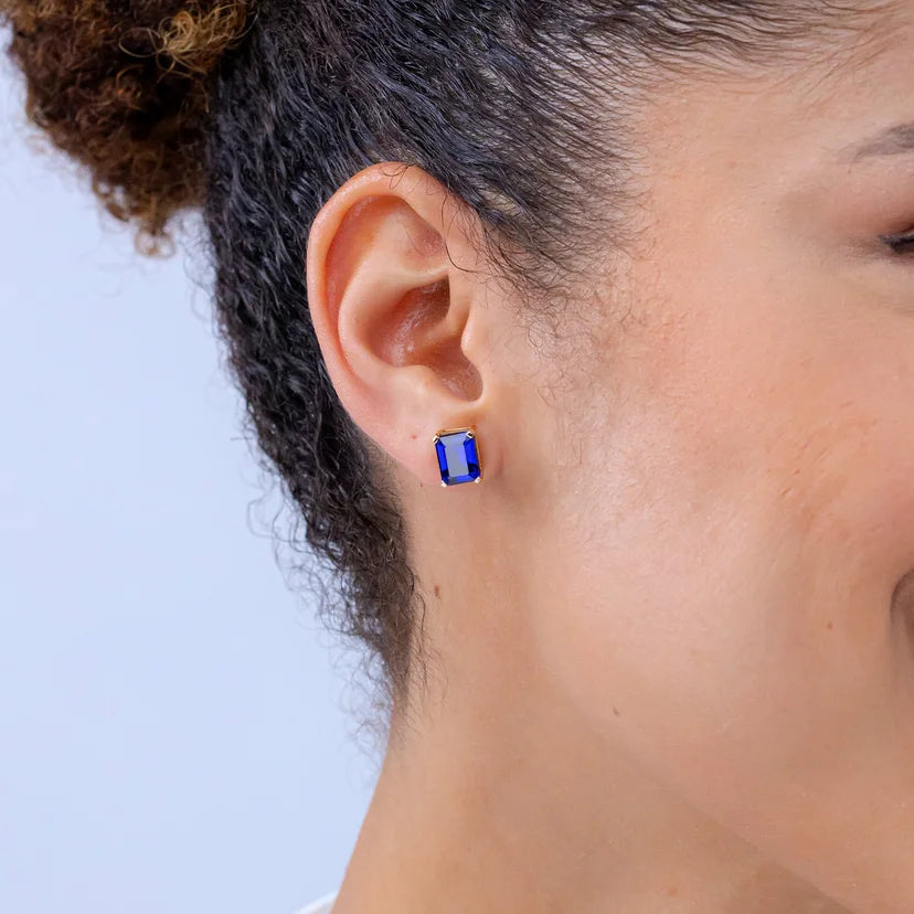 emerald lab grown sapphire earrings in 14k gold, top view
