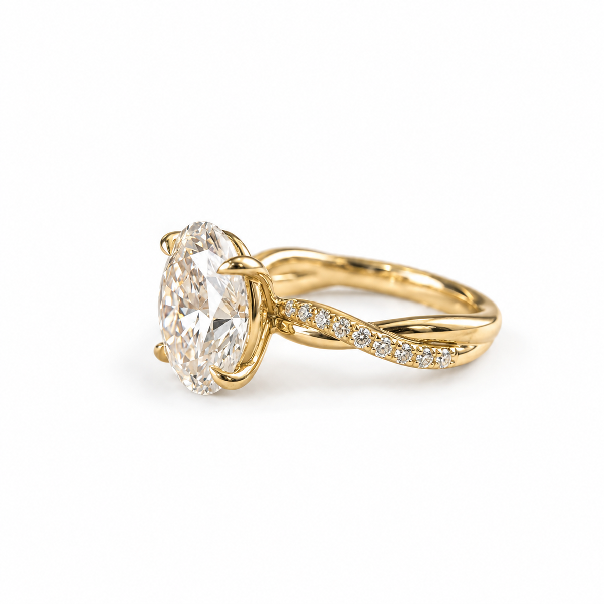 oval lab grown diamond engagement ring in 14k gold, top view