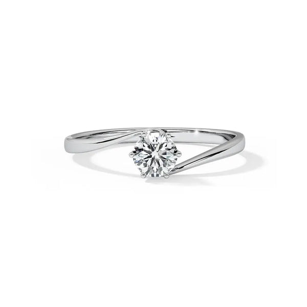 round lab grown diamond solitaire engagement ring in silver, three-quarter view