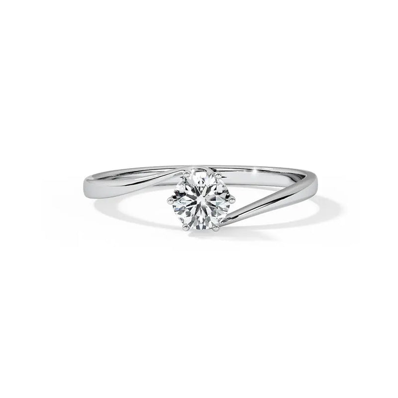 round lab grown diamond solitaire engagement ring in silver, three-quarter view