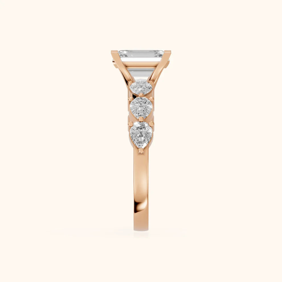 emerald lab grown diamond three stone engagement ring in 14k gold, top view